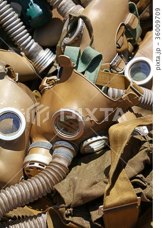 Old vintage worn respirator gas masks close up 36009709