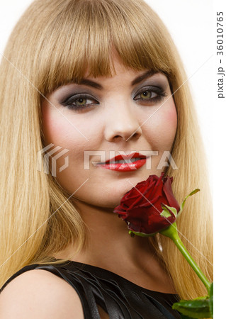 Woman gorgeous girl dark makeup holds rose flower 36010765