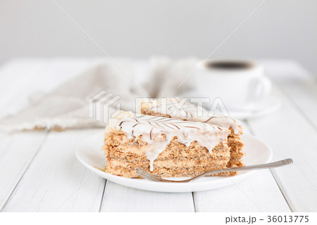 Esterhazy cake sliced on white plate close-up 36013775