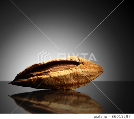 Almond on black background. Close-up or macro Almond on black background. Close-up or macro 36015297