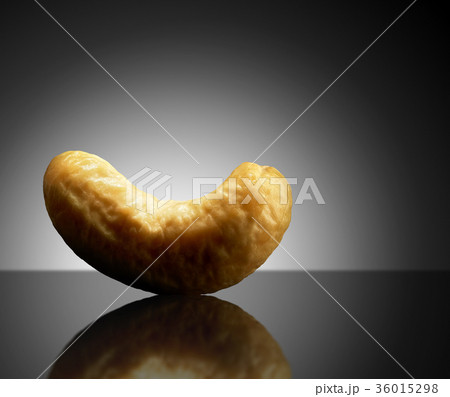 Cashew on black background. Close-up or macro Cashew on black background. Close-up or macro 36015298