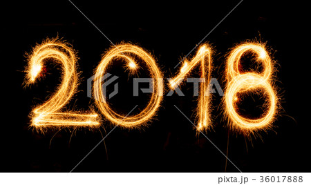 2018 with sparklers on black background 36017888