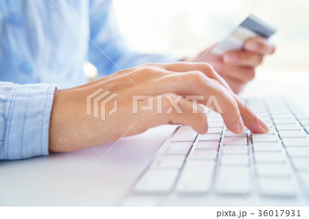 Woman using a credit card for online payments. The concept of on Woman using a credit card for online payments. The concept of on 36017931