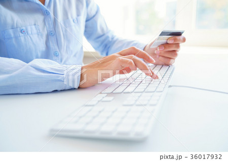 Woman using a credit card for online payments. The concept of on Woman using a credit card for online payments. The concept of on 36017932
