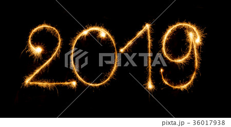 2019 with sparklers on black background 36017938