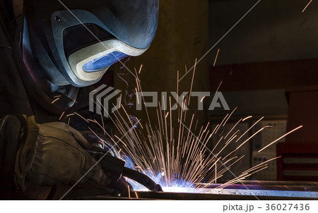 Industrial steel welder in factory Industrial steel welder in factory 36027436