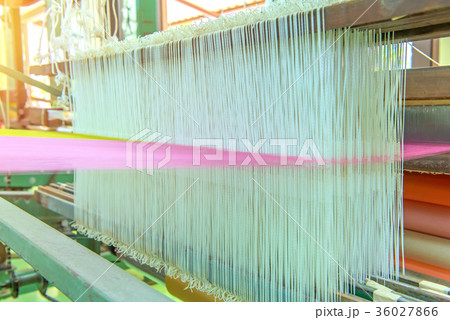 Weaving loom and shuttle on the warp 36027866