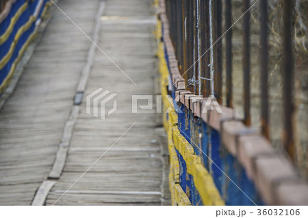 Rope suspension wooden bridge. 36032106