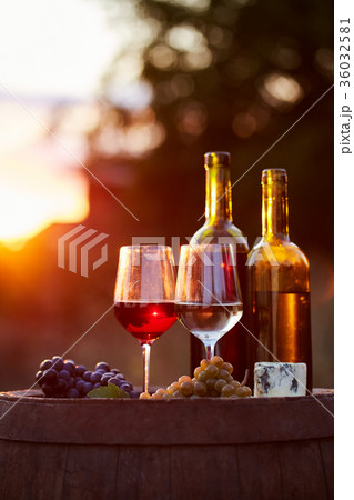 Two glasses of white and red wine with food Two glasses of white and red wine with food 36032581