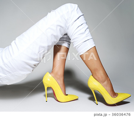 women legs in beautiful fashionable high heels women legs in beautiful fashionable high heels 36036476