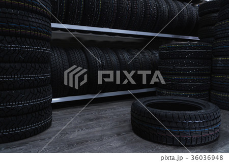 A large number of car tires. Car tire store A large number of car tires. Car tire store 36036948