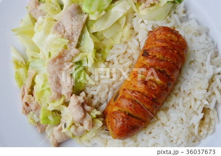 stir fried cabbage and Thai pork sausage on rice 36037673