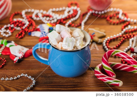 Cup of cocoa with marshmallow. 36038500