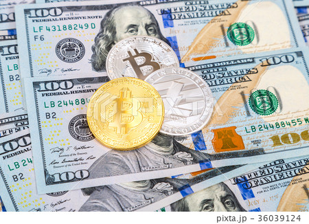 Gold and silver coins of cryptocurrency lying over 36039124