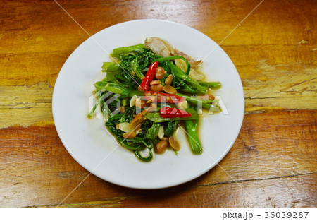 stir fried water spinach with chili and soy bean stir fried water spinach with chili and soy bean 36039287