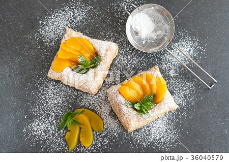 Puff pastry cookies with chocolate cream, apricots 36040579