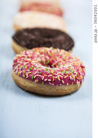 Multicolored donuts close-up 36042001
