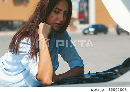 Beautiful woman has problem with the car Beautiful woman has problem with the car 36042008