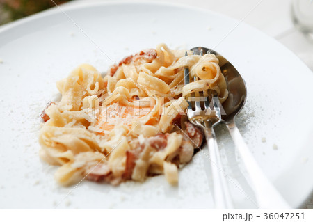 Traditional italian pasta carbonara with bacon and 36047251
