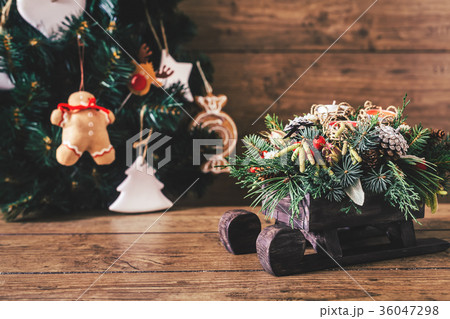 Christmas Gifts with Boxes on Wooden Background Christmas Gifts with Boxes on Wooden Background 36047298