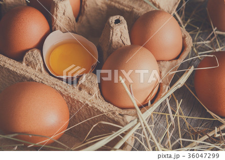 Fresh chicken brown eggs in carton on rustic wood 36047299