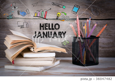 hello january, Business Concept. Stack of books and pencils on the wooden table hello january, Business Concept. Stack of books and pencils on the wooden table 36047482