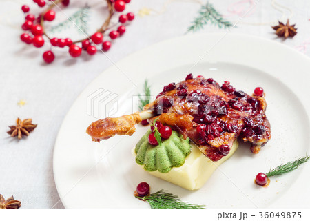 roasted duck leg with cranberry sauce roasted duck leg with cranberry sauce 36049875