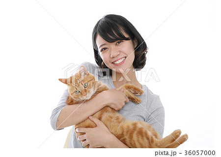 猫と女性の写真素材