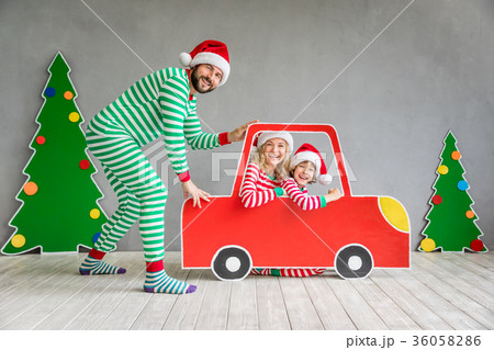 Happy family on Christmas eve 36058286
