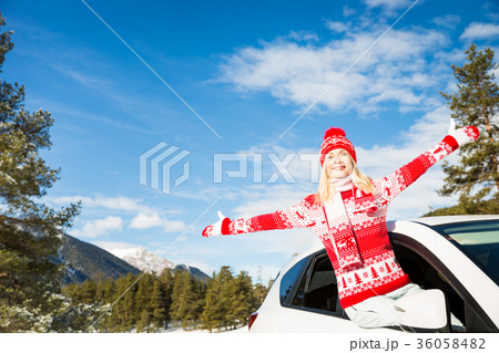 Happy woman travel by car in winter Happy woman travel by car in winter 36058482