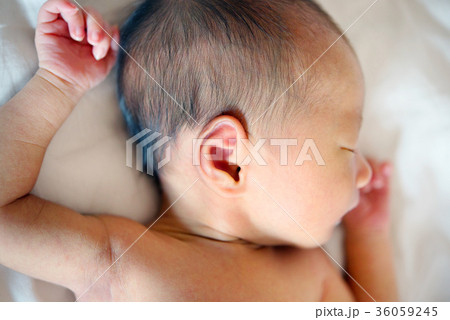 Sleeping Asian newborn baby 36059245