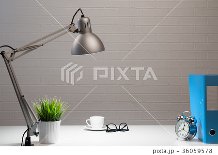 Empty white working table in fis at night Empty white working table in fis at night 36059578