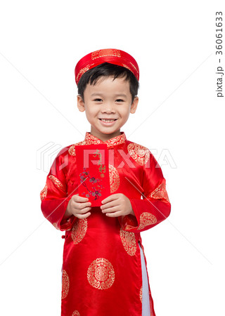 Little Vietnamese boy holding red envelops for Tet 36061633