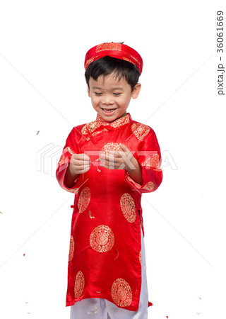 Happy Vietnamese boy in red Ao Dai celebrating 36061669