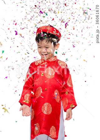 Happy Vietnamese boy in red Ao Dai celebrating 36061670