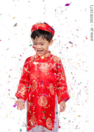 Happy Vietnamese boy in red Ao Dai celebrating  36061671