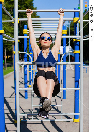 athletic woman trainer on sport playground athletic woman trainer on sport playground 36062807