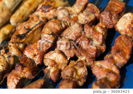 Prepared shashlik, lamb meat grilling on metal 36063425