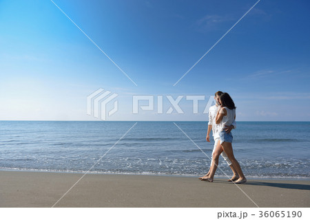 Young happy couple on white beach at summer 36065190