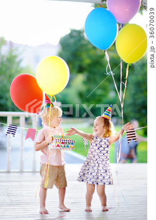 Little boy and girl celebrate birthday party Little boy and girl celebrate birthday party 36070039
