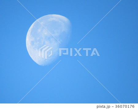 Big white moon close up over blue sky 36070176