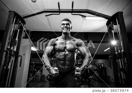 Bodybuilder Is Working On His Chest With Cable Bodybuilder Is Working On His Chest With Cable 36073974