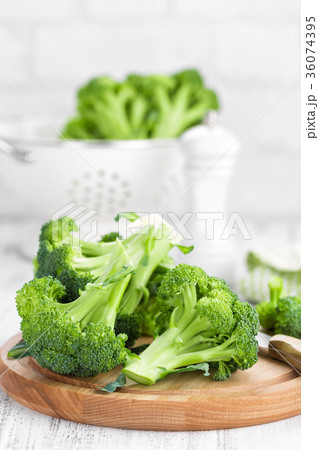 Fresh broccoli on white background closeup Fresh broccoli on white background closeup 36074395