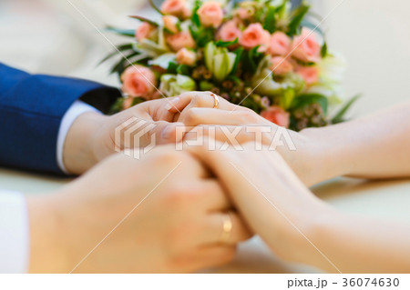 Close-up of wedding hands with rings Close-up of wedding hands with rings 36074630