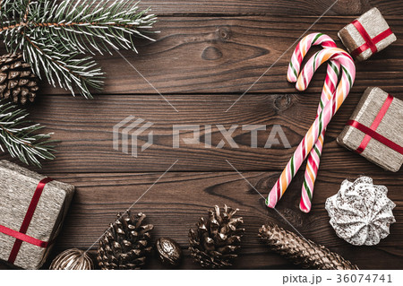 Brown wood background. greeting card. Fir tree Brown wood background. greeting card. Fir tree 36074741