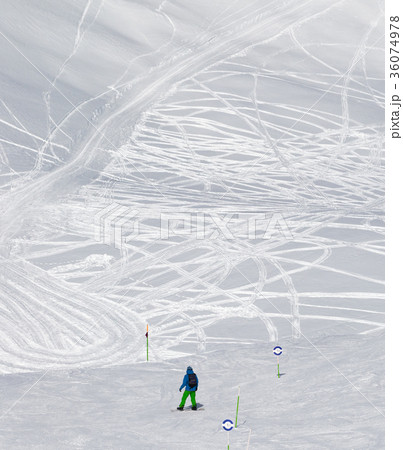 Snowboarder before downhill on freeriding trace 36074978