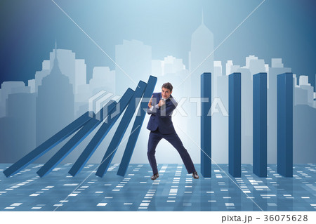 Businessman in domino effect business concept 36075628