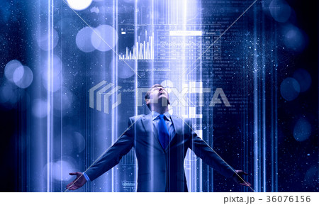 Man standing in light 36076156