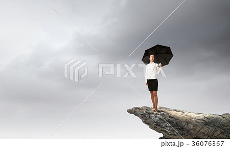 Woman with umbrella 36076367