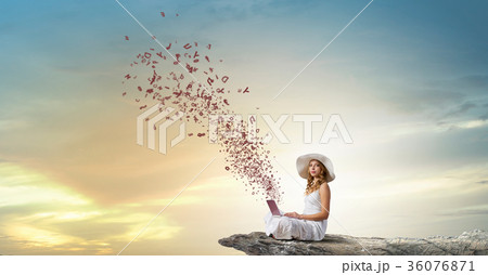 Lady using laptop 36076871